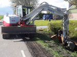 Midikraan bij beschoeingswerkzaamheden