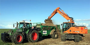 Bunning meststrooier met mobiele kraan